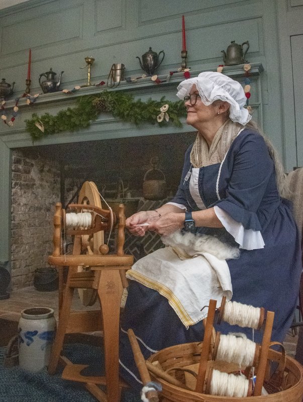 Nancy Witmer spins wool for yarn at the Daughters of the American Revolution’s Thomas Maull House.